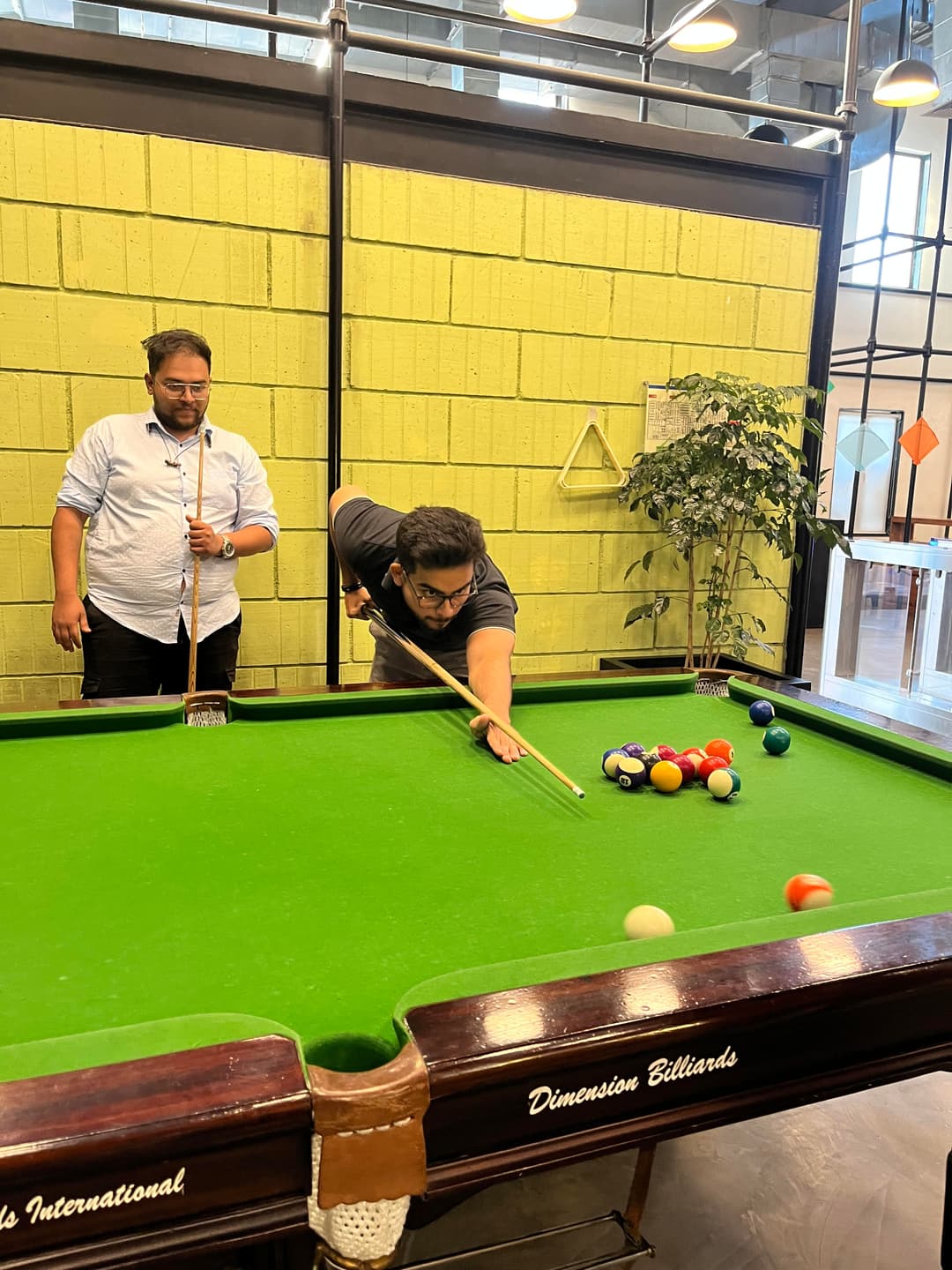 Me and my friend Vighnesh playing pool at QED42 office in Pune