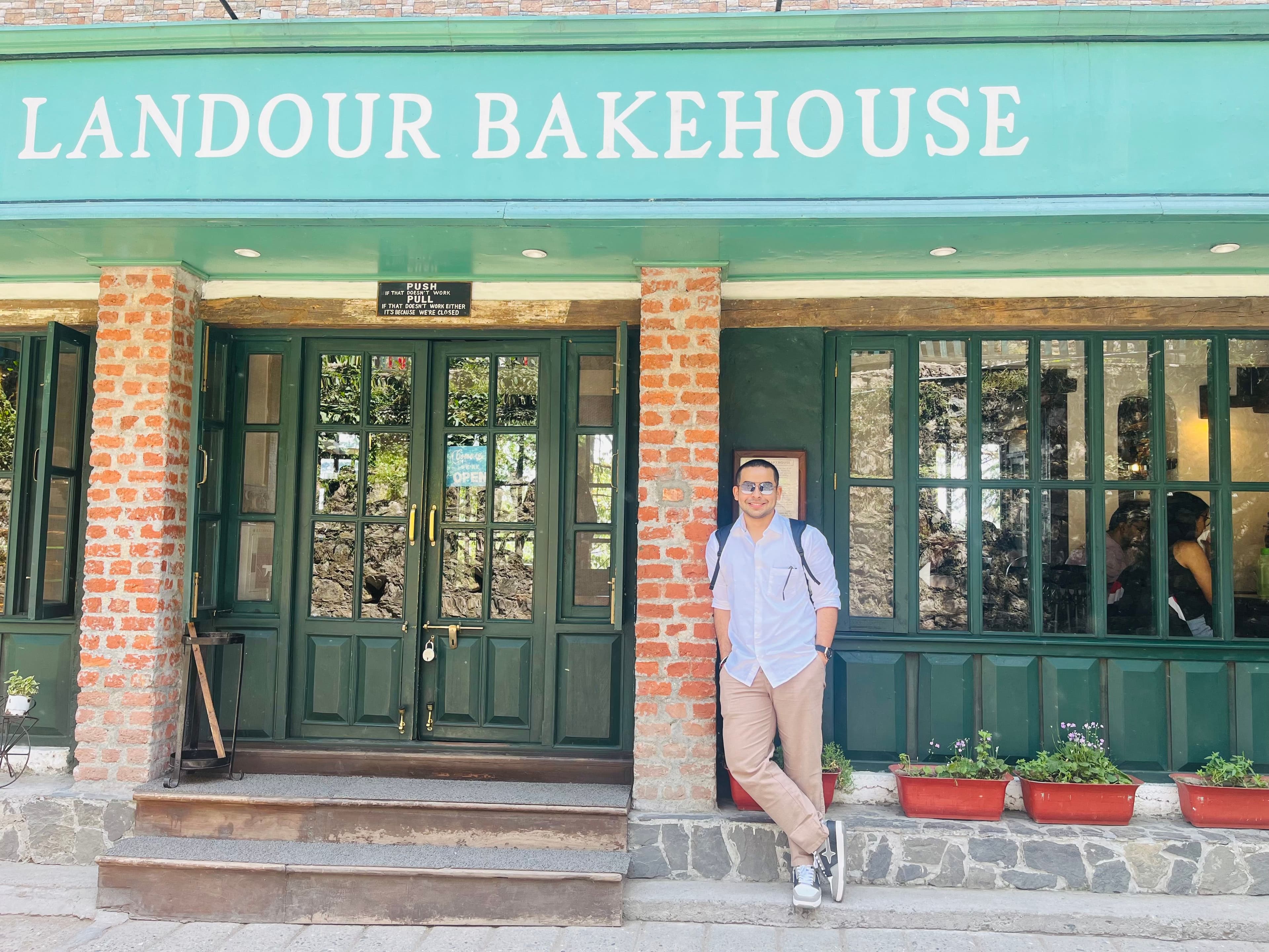Me at the entrance of Landour Bakehouse in Landour, Mussoorie